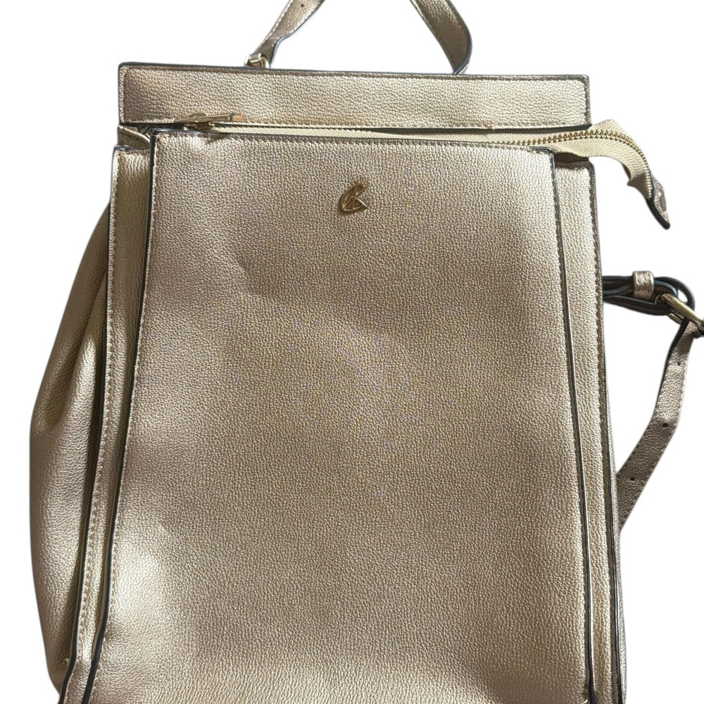 Gold Backpack with Sleek Design and Luxurious Finish